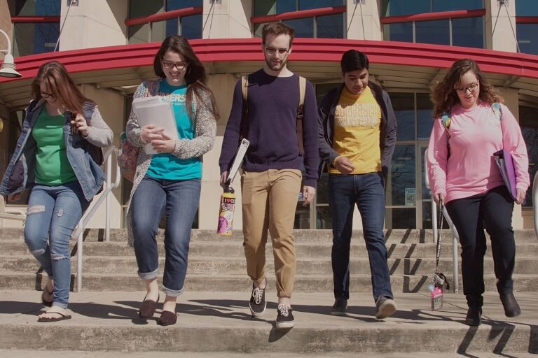 students walking down some steps outside